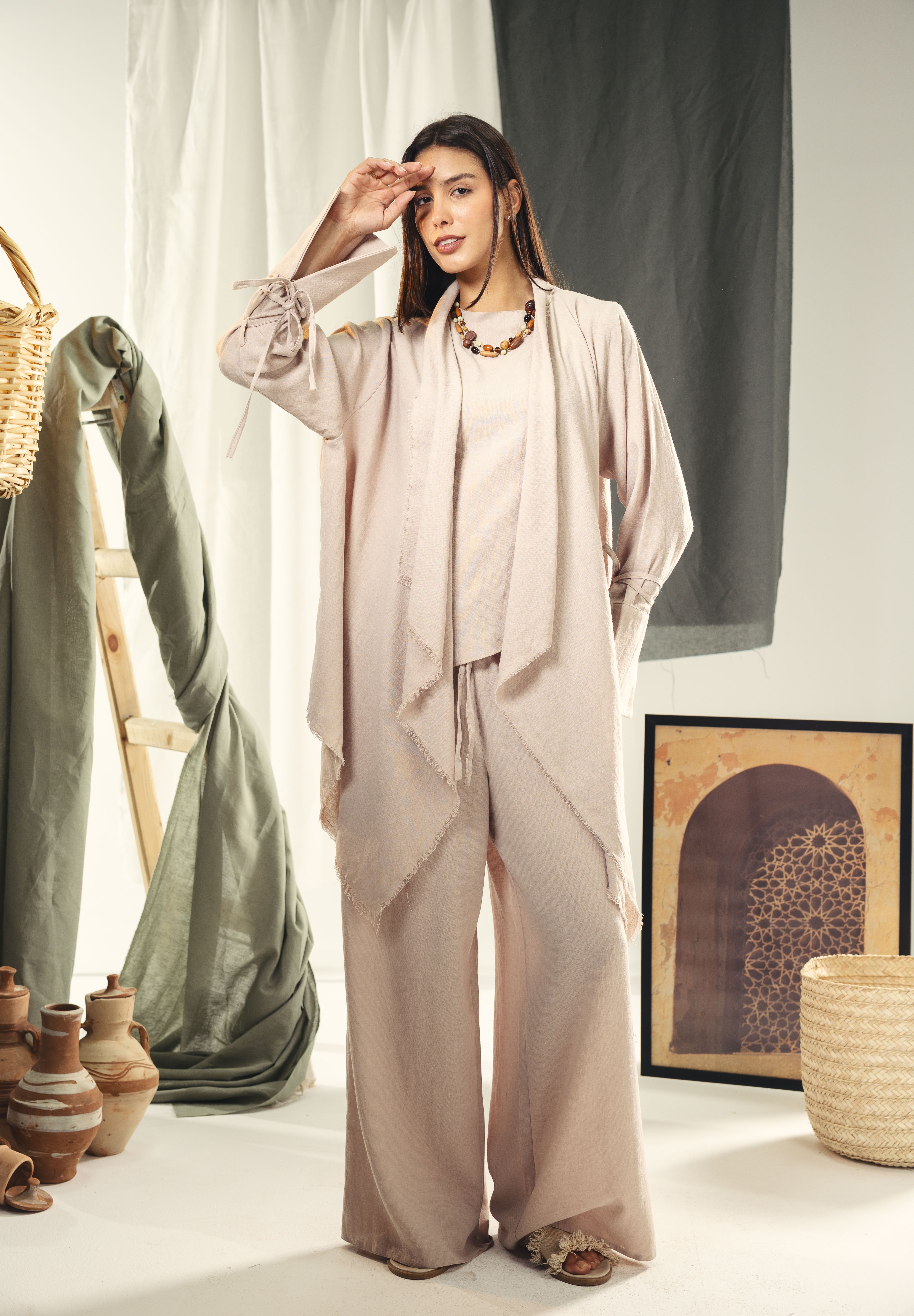 Boho unfinished cardigan with strings in the sleeves Beige