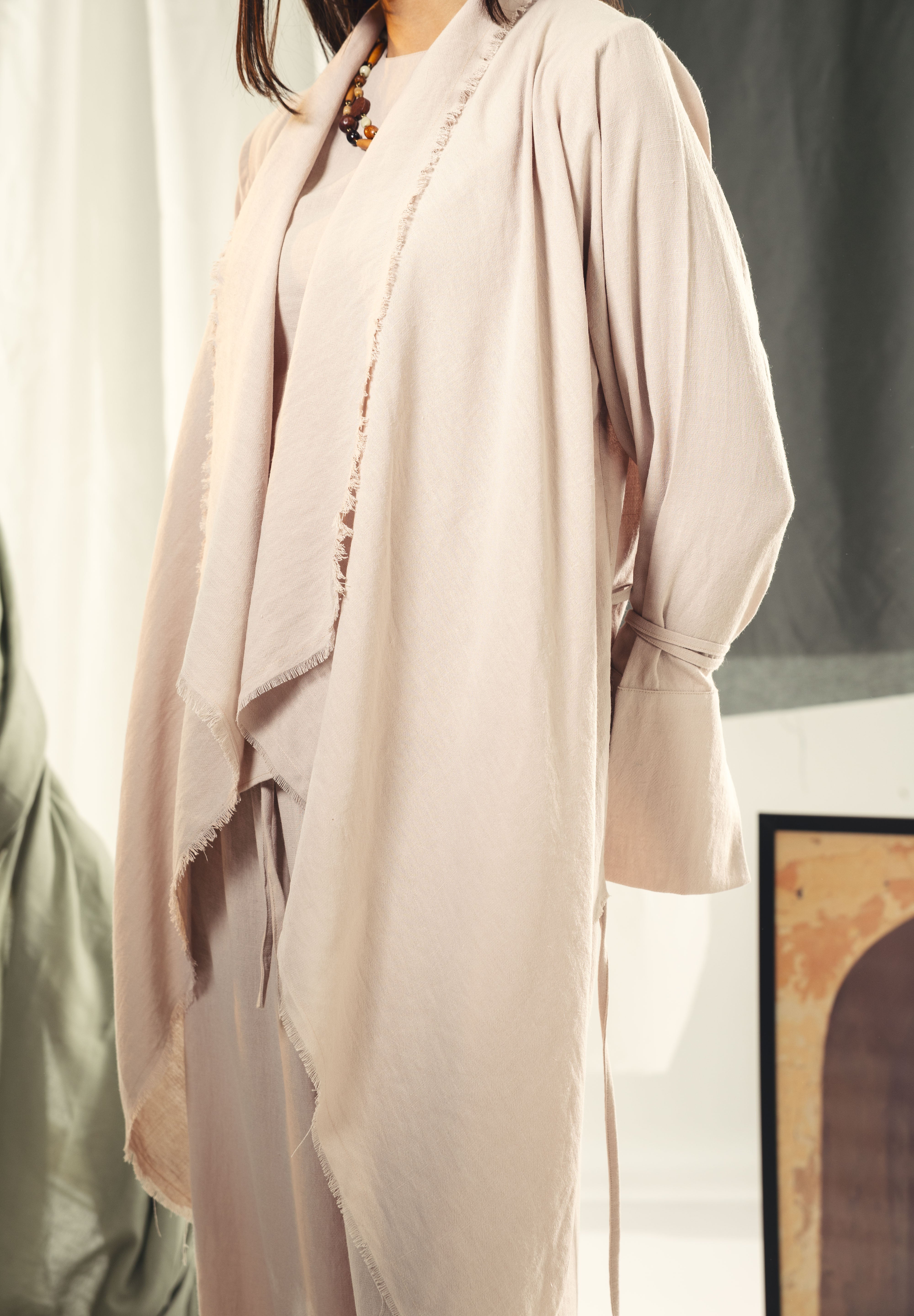 Boho unfinished cardigan with strings in the sleeves Beige