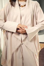 Boho unfinished cardigan with strings in the sleeves Beige