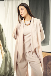 Boho unfinished cardigan with strings in the sleeves Beige
