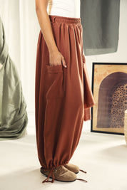 Balloon pants with a waist band and a scarf Orange
