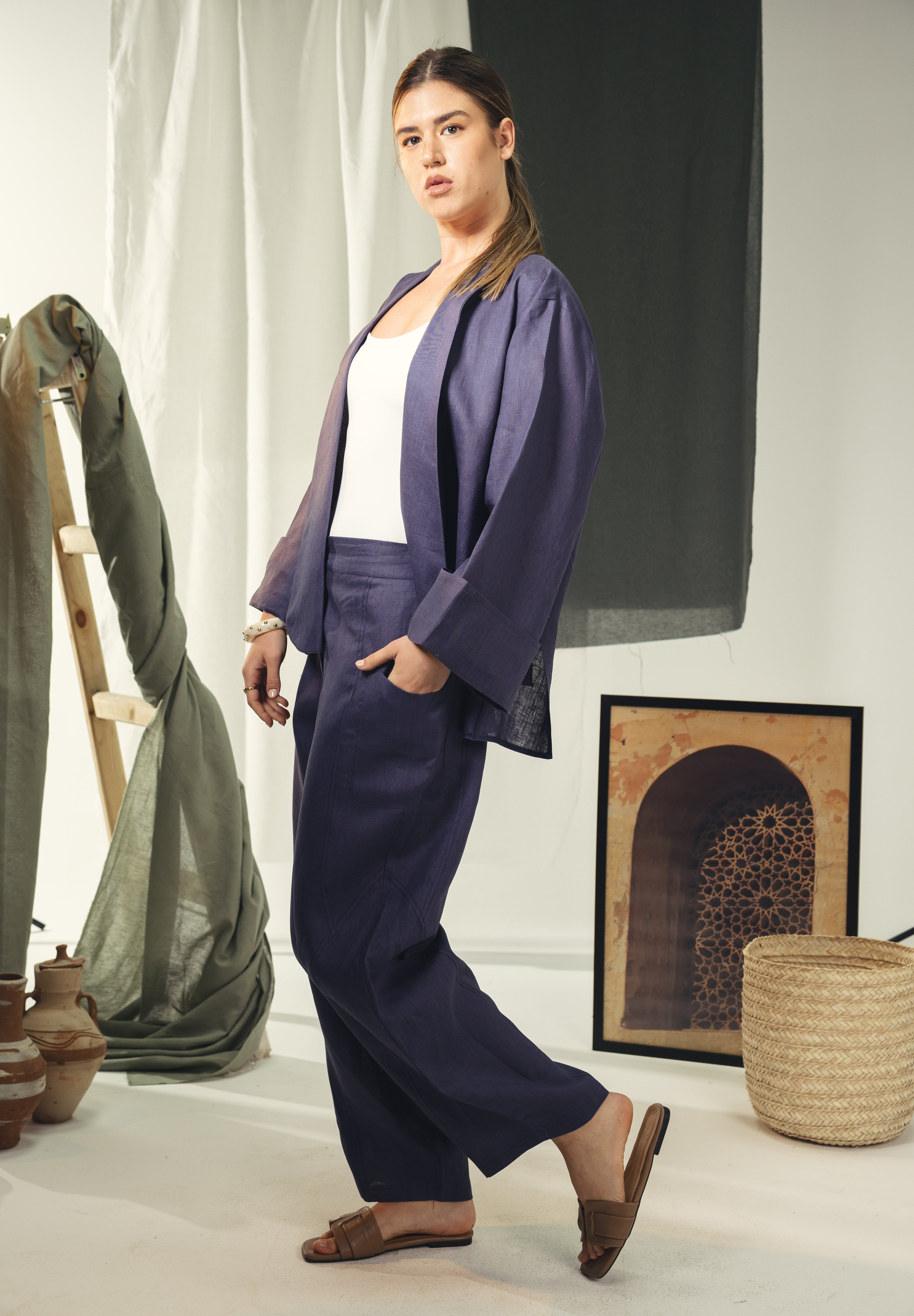 Cardigan with a cut in the sides and collars with curved ends Indigo blue