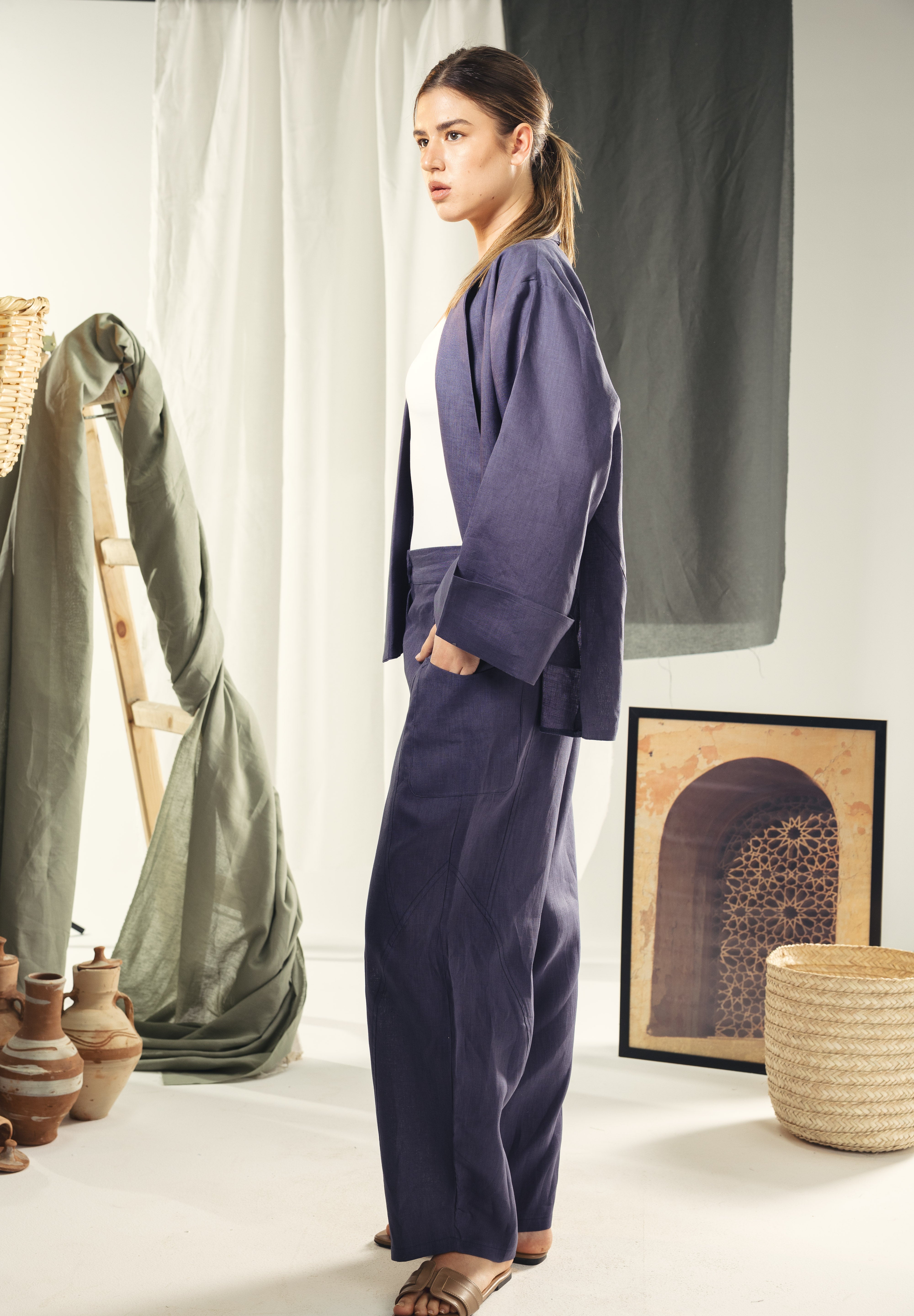 Cardigan with a cut in the sides and collars with curved ends Indigo blue