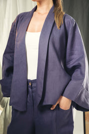 Cardigan with a cut in the sides and collars with curved ends Indigo blue