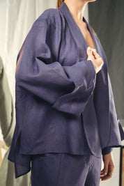 Cardigan with a cut in the sides and collars with curved ends Indigo blue