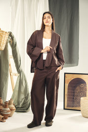 Cardigan with a cut in the sides and collars with curved ends brown