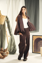 Cardigan with a cut in the sides and collars with curved ends brown