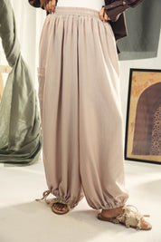 Balloon pants with a waist band and a scarf Beige