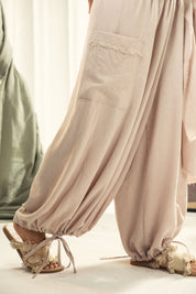 Balloon pants with a waist band and a scarf Beige