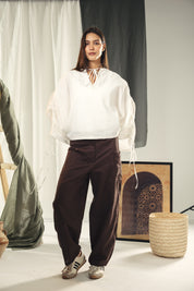 White blouse with straw strings