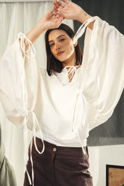 White blouse with straw strings