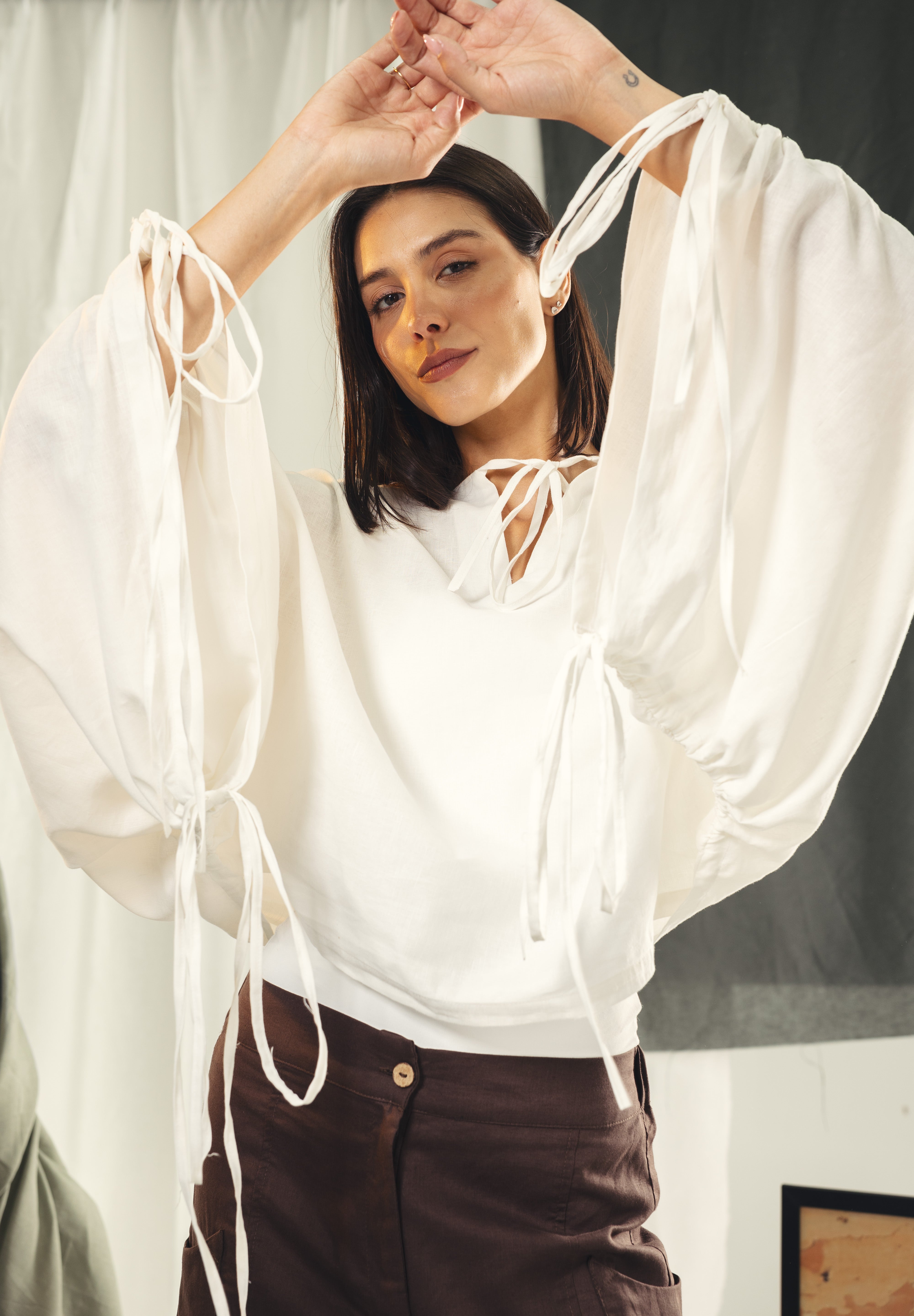 White blouse with straw strings