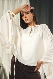 White blouse with straw strings