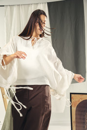 White blouse with straw strings