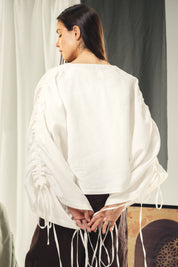 White blouse with straw strings