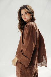 Cardigan with a cut in the sides and collars with curved ends Babyblue
