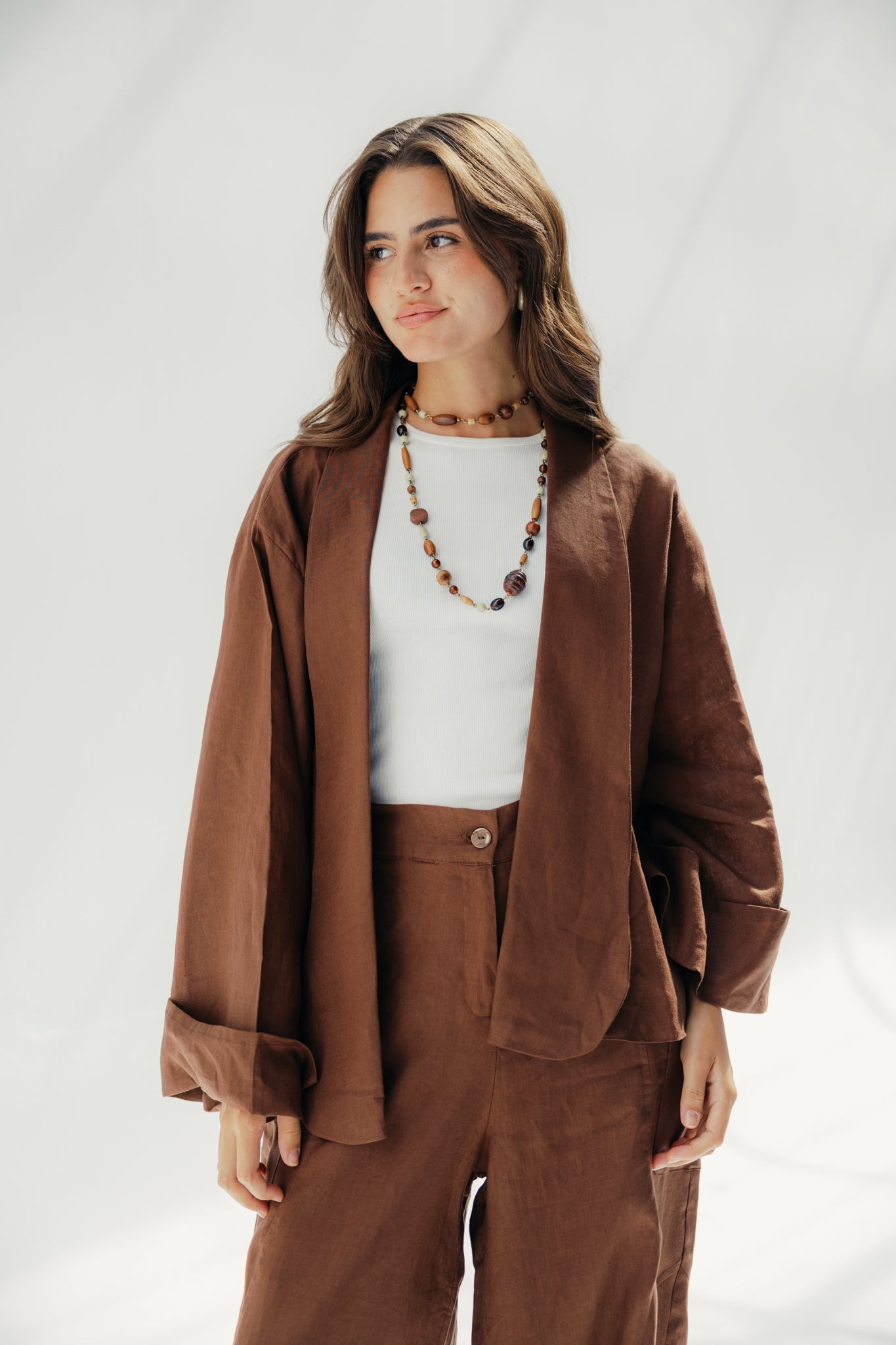 Cardigan with a cut in the sides and collars with curved ends Babyblue