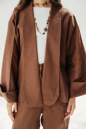 Cardigan with a cut in the sides and collars with curved ends Babyblue
