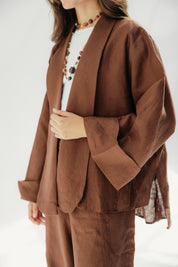 Cardigan with a cut in the sides and collars with curved ends Babyblue