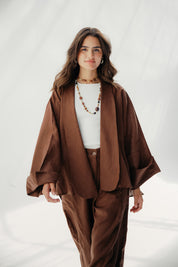 Cardigan with a cut in the sides and collars with curved ends Babyblue