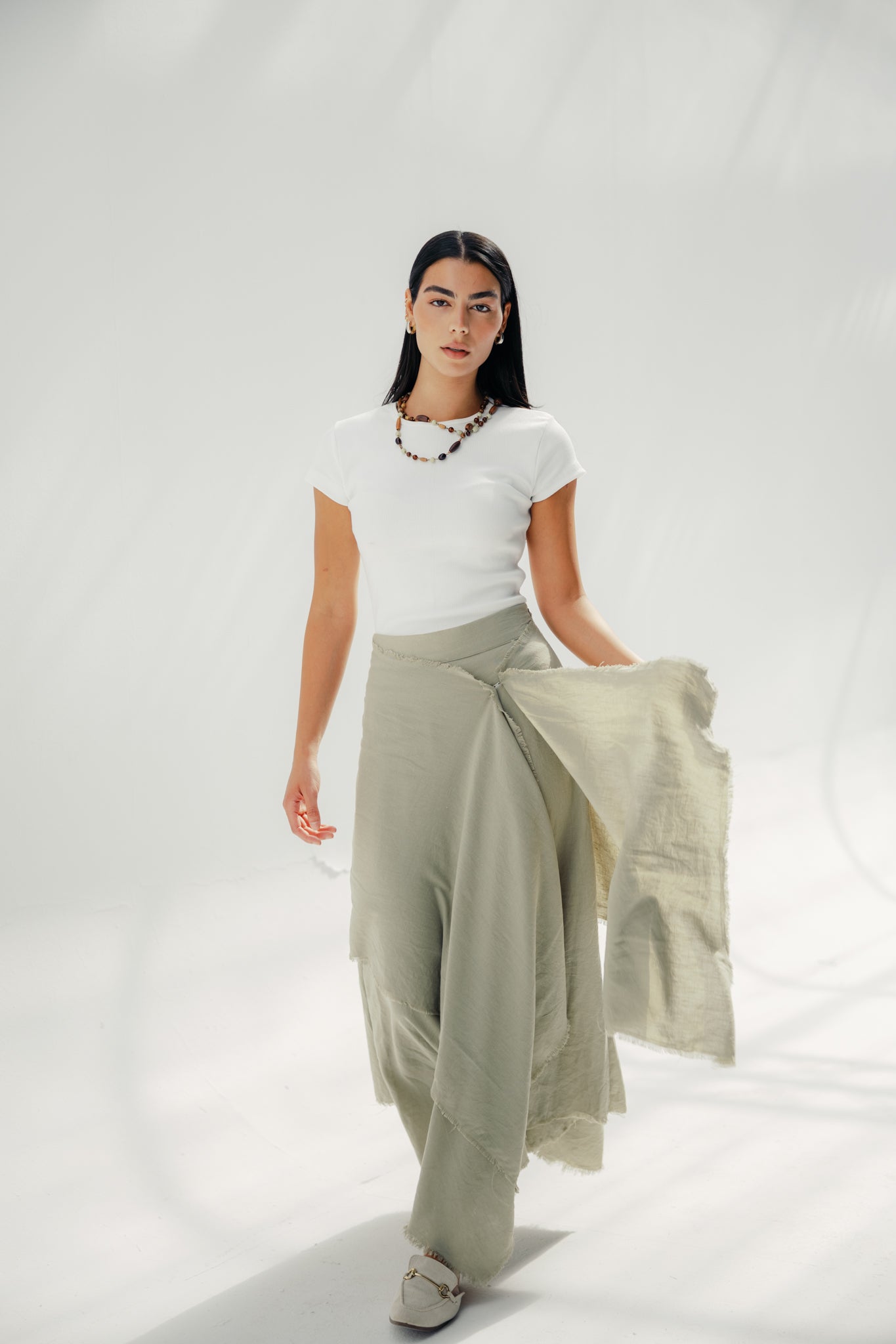 A Flowy skirt with different lengths Olive
