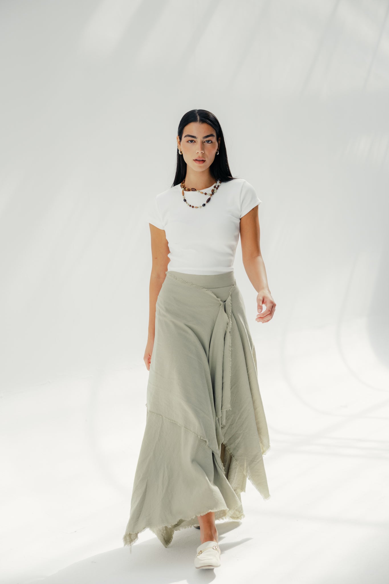 A Flowy skirt with different lengths Olive