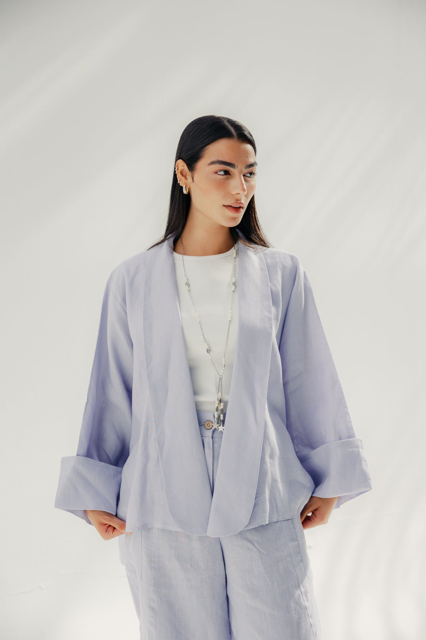 Cardigan with a cut in the sides and collars with curved ends Light Brown