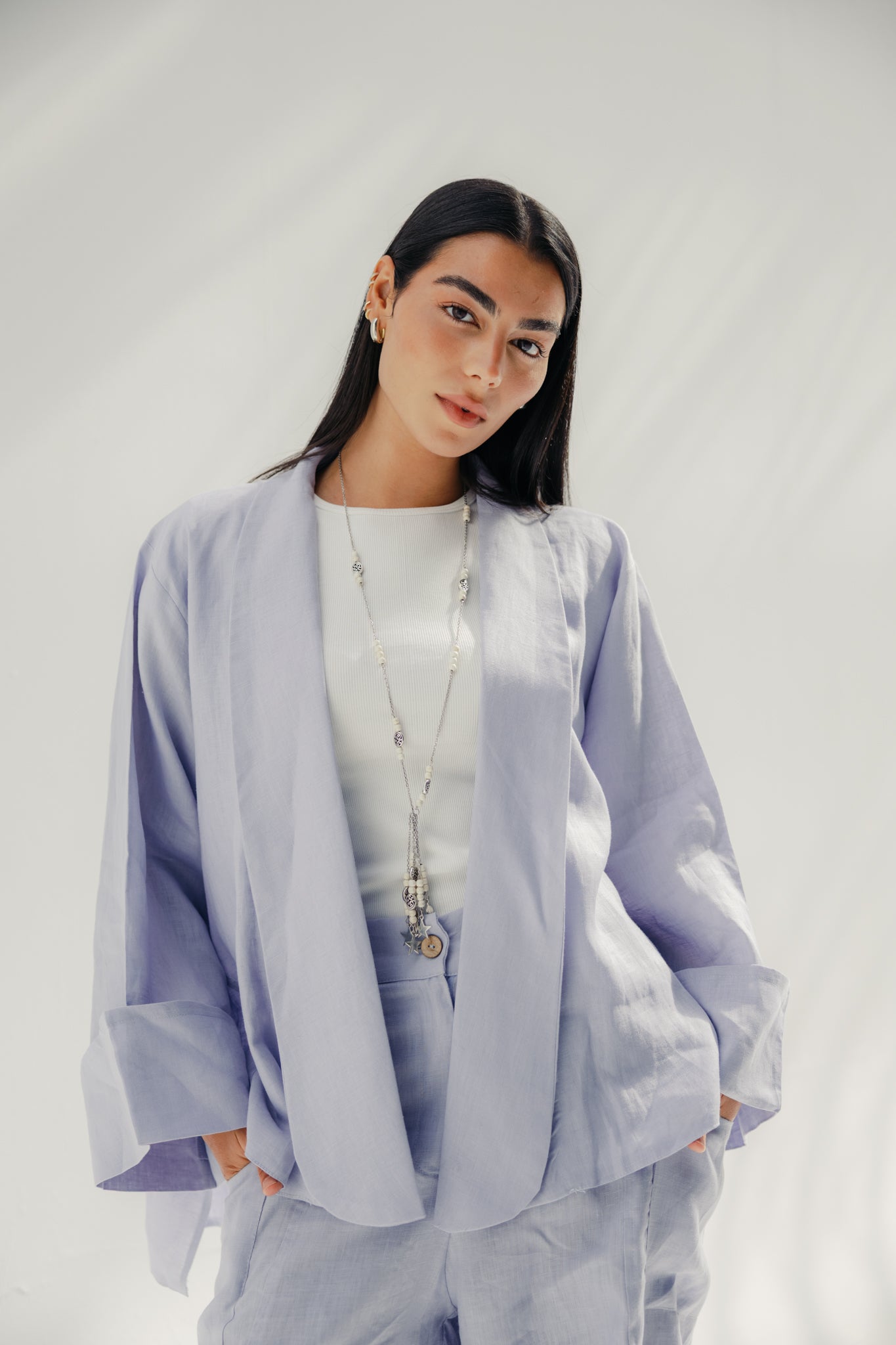 Cardigan with a cut in the sides and collars with curved ends Light Brown