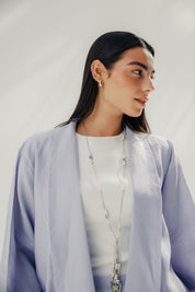 Cardigan with a cut in the sides and collars with curved ends Light Brown